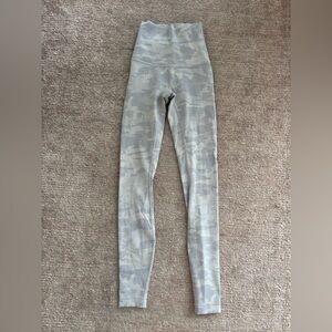 White and gray size 0 Lululemon leggings.
